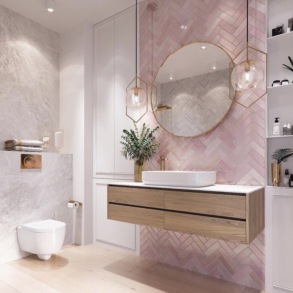 Bathroom vanity with a sink, mirror, and clear counter