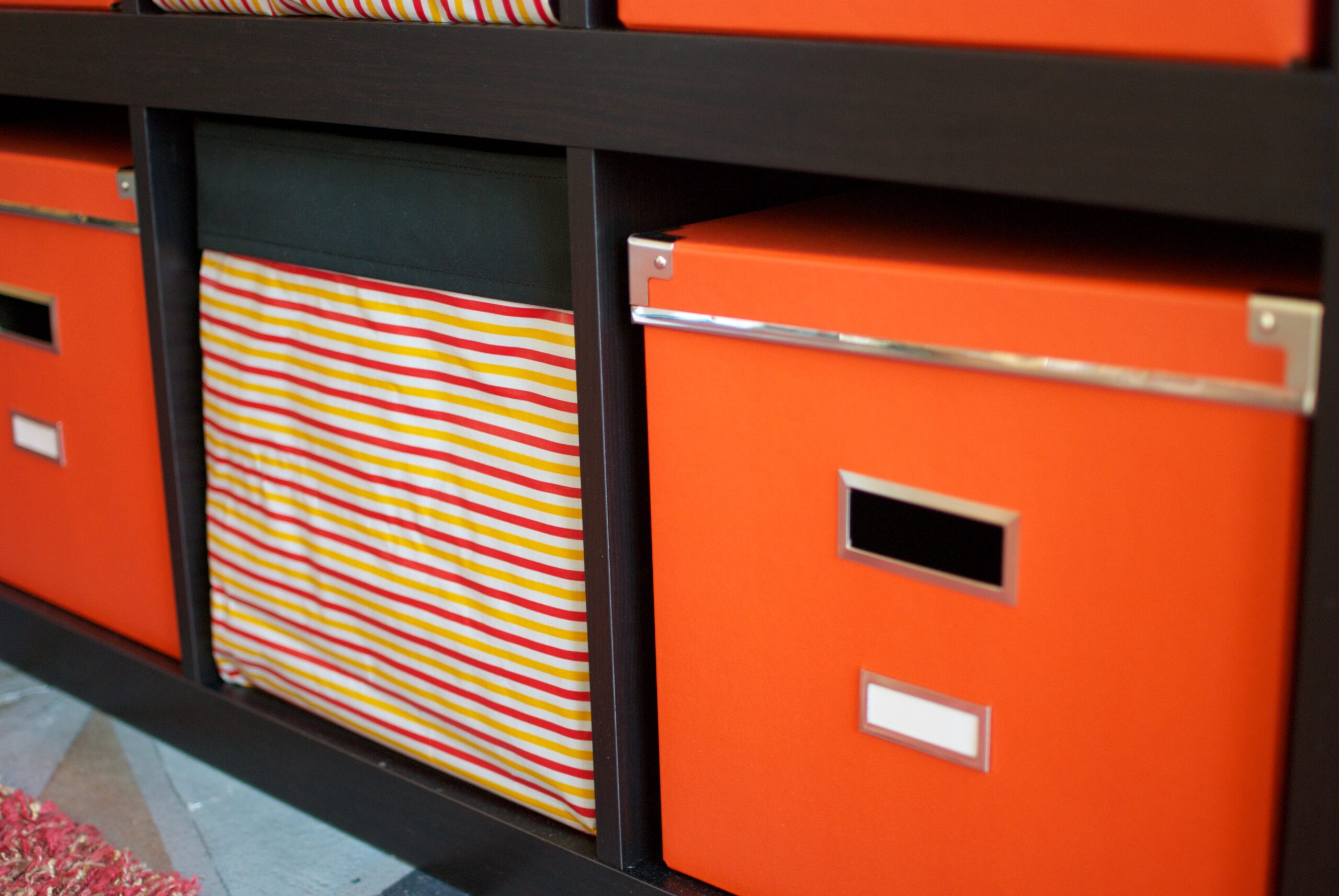 Stacked cardboard storage boxes on shelves