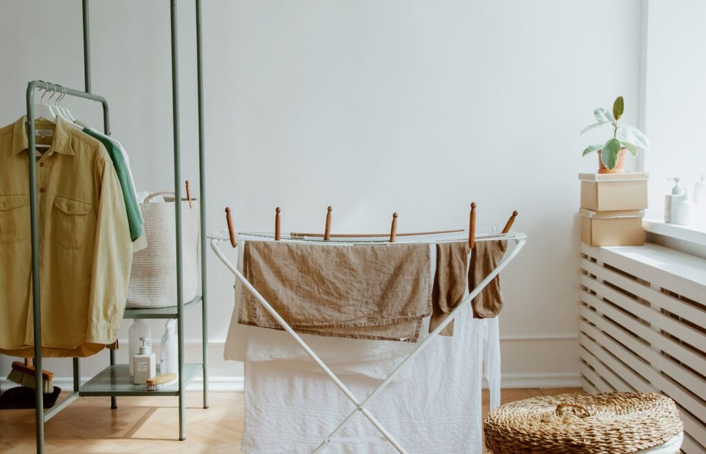 Drying rack and clothing rack in a compact laundry area