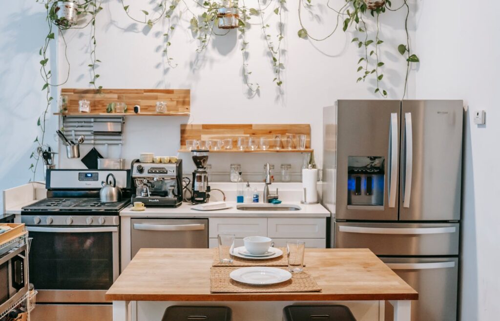 Organized kitchen counter with jars and cooking items for a room-by-room home organization checklist