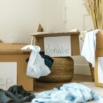 Home organization boxes labeled keep donate and trash on a floor